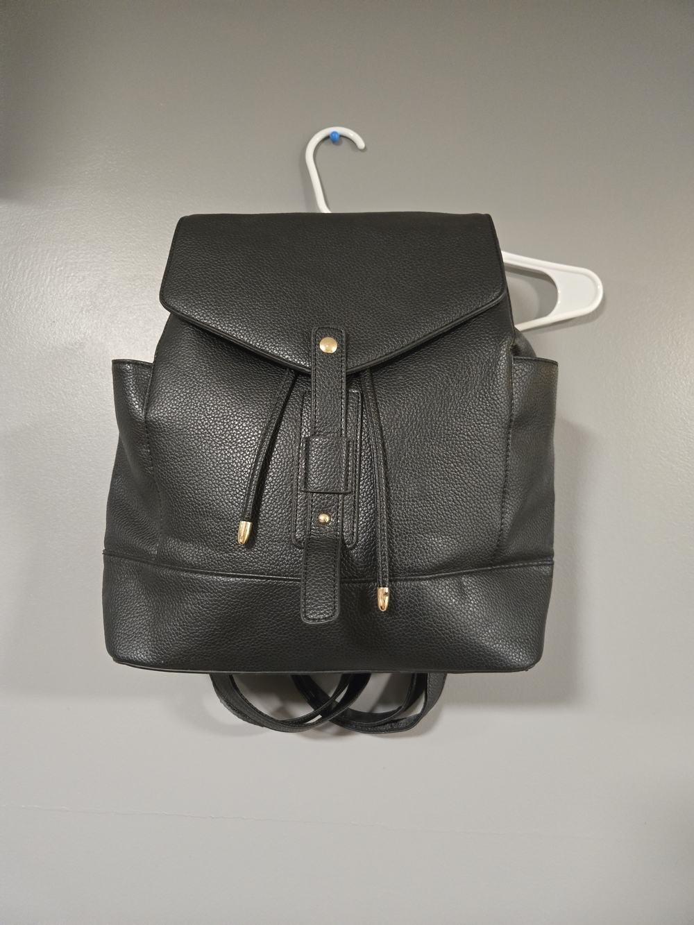 Women’s Black Pebbled Drawstring Backpack with Gold Accents
